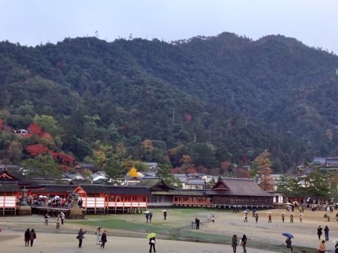 This is the actual Itsukushima shrine, even though the orange torii built in the water is the most famous symbol. The line to get in to the shrine was obscenely long. So, one of the many reasons I love my wife, Lisa and I both decided the wait wasn't worth the while and we would be able to get just as good of a view from the beach.