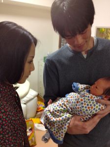 Lisa with her brother and his newborn son Hiroto.