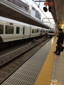 The proper way to wait for a train.