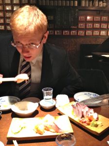 This is a picture of me eating sushi in our favorite island sushi bar. While sushi is my fave, I never know what kind of fish I am eating.