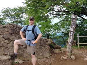 Sucking in the gut at the peak of Mount Hinode.